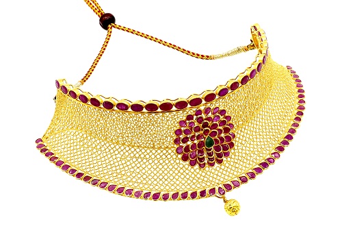 beautiful golden necklace with red stones